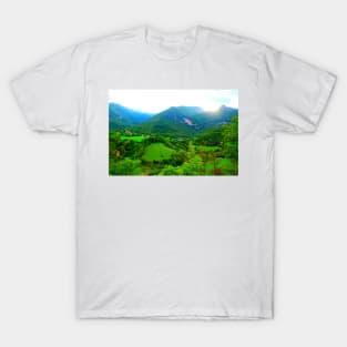 View from Sarnano at the Sibillini Mountains, hills, cattle, buildings T-Shirt